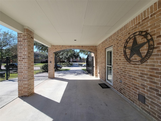 view of patio / terrace featuring a gate