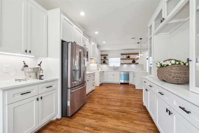 kitchen featuring light wood finished floors, white cabinetry, stainless steel appliances, and open shelves