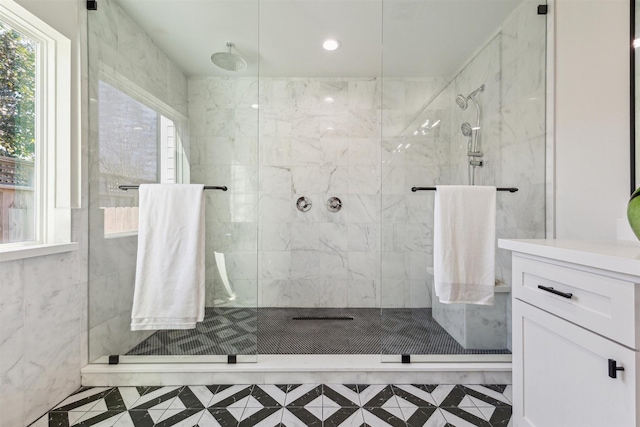bathroom featuring a shower stall and recessed lighting