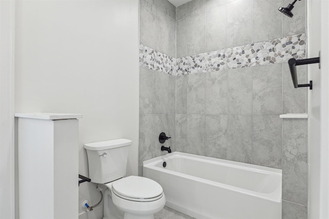 bathroom with toilet and shower / bathtub combination