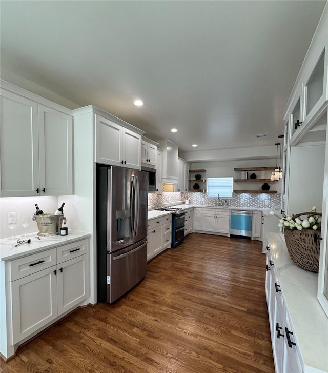 kitchen featuring decorative backsplash, stainless steel appliances, dark wood-type flooring, and open shelves