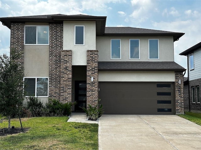 view of front of property with brick siding, stucco siding, concrete driveway, a garage, and a front lawn