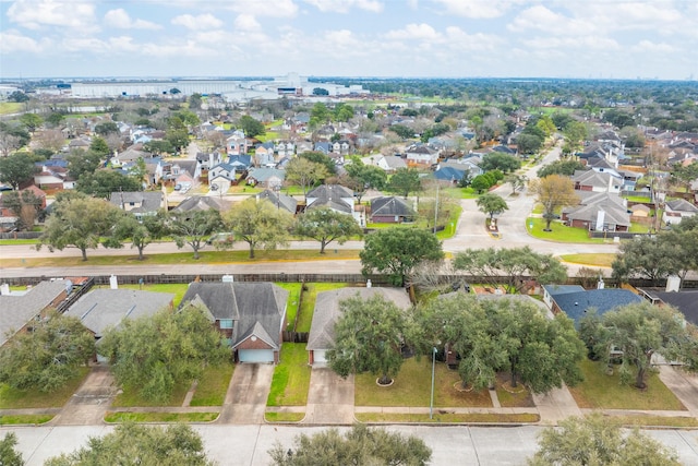 aerial view featuring a residential view and a water view