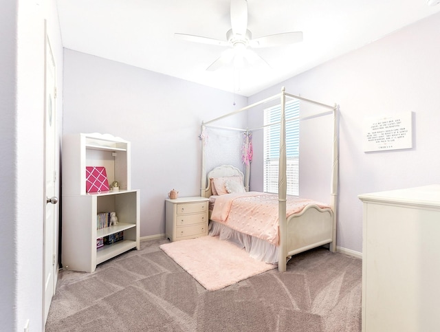 bedroom featuring light carpet, ceiling fan, and baseboards