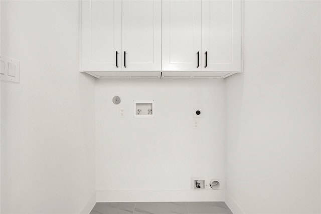 washroom with electric dryer hookup, marble finish floor, cabinet space, baseboards, and hookup for a washing machine