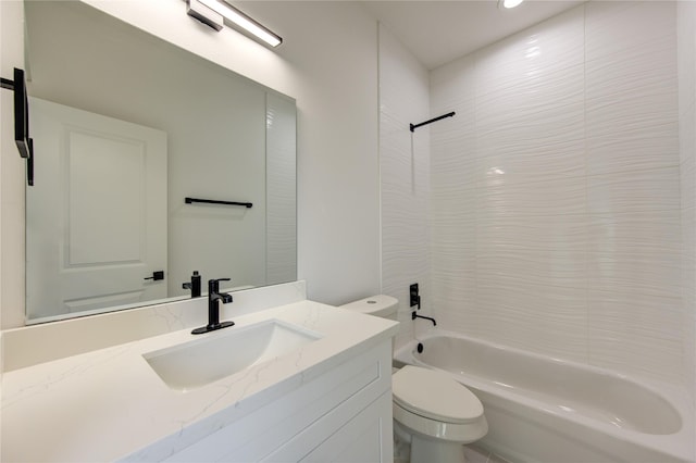 bathroom with shower / bathing tub combination, toilet, and vanity