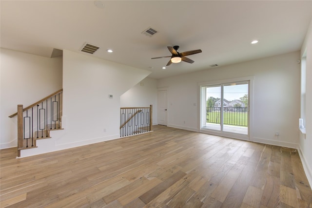 empty room featuring visible vents, recessed lighting, light wood-type flooring, and ceiling fan