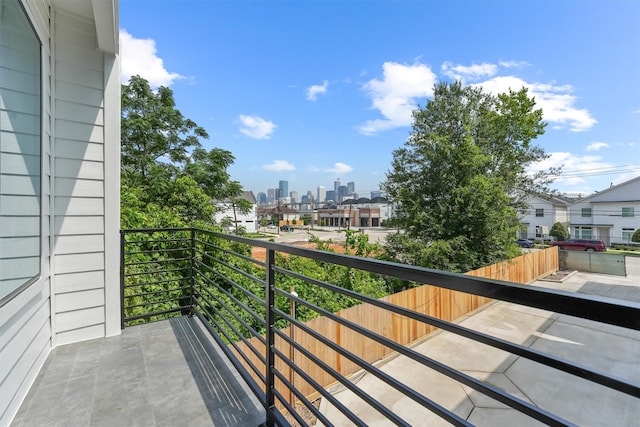 balcony featuring a city view