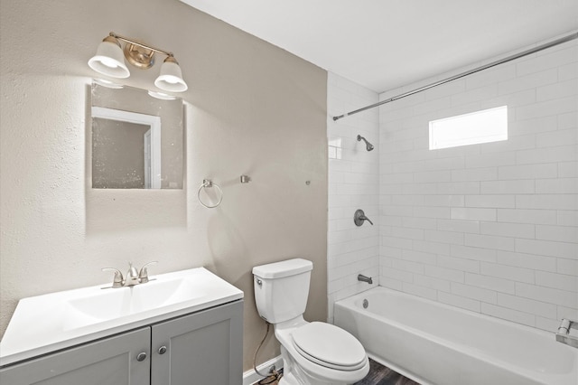 full bathroom featuring toilet, shower / washtub combination, and vanity