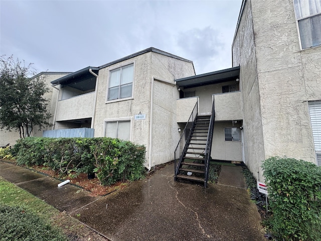 view of property with stairs