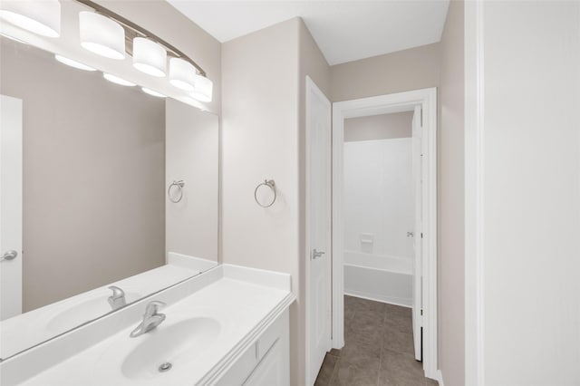 bathroom with vanity and tile patterned floors