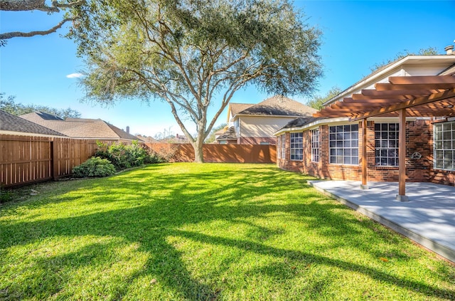 view of yard featuring a fenced backyard and a pergola