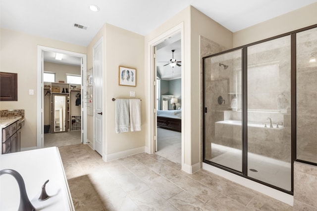 full bath with ensuite bathroom, a stall shower, vanity, and visible vents