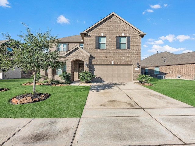 traditional-style house featuring a front yard, concrete driveway, and brick siding