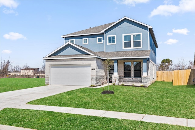 view of front facade with a garage, concrete driveway, fence, a front yard, and brick siding