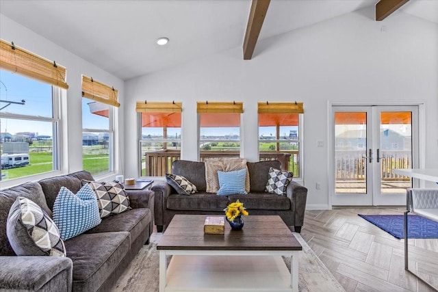 living area featuring lofted ceiling with beams, french doors, a wealth of natural light, and recessed lighting