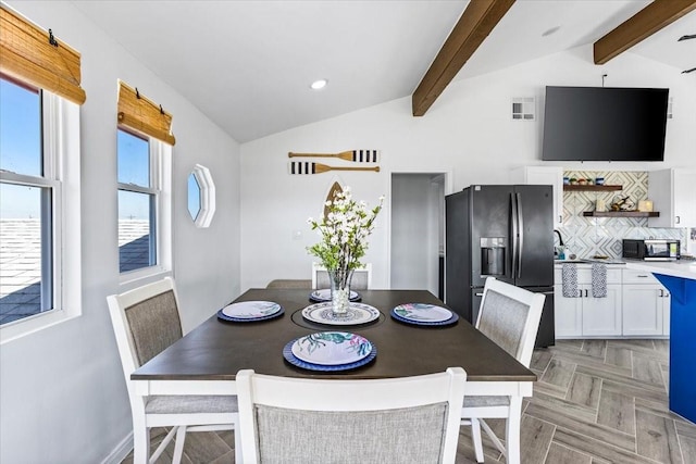 dining room with recessed lighting, visible vents, and vaulted ceiling with beams