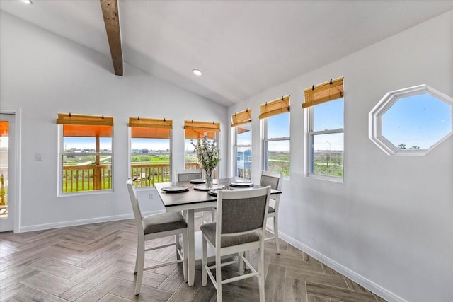 dining space with plenty of natural light, recessed lighting, vaulted ceiling with beams, and baseboards