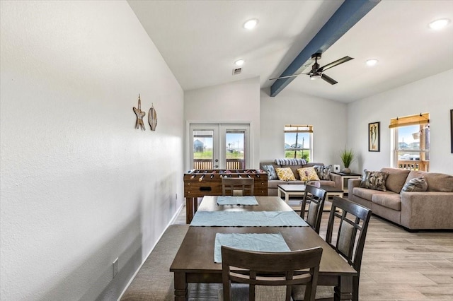 dining space featuring vaulted ceiling with beams, ceiling fan, recessed lighting, light wood-style flooring, and french doors