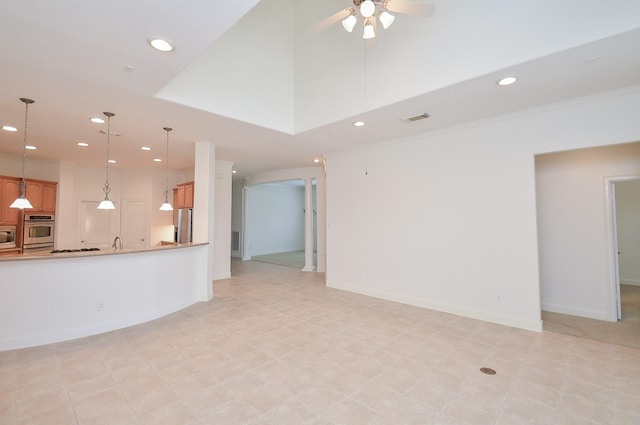 unfurnished living room featuring a ceiling fan, recessed lighting, and visible vents