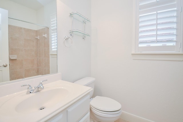 full bath with vanity and toilet