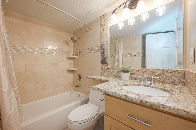 full bathroom with shower / bath combination with curtain, vanity, and toilet