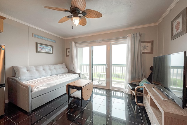 living room featuring ceiling fan, granite finish floor, and crown molding