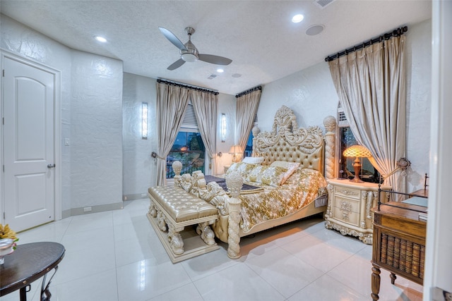 bedroom with a textured ceiling, a textured wall, ceiling fan, and recessed lighting