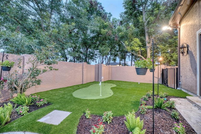 view of yard featuring a fenced backyard