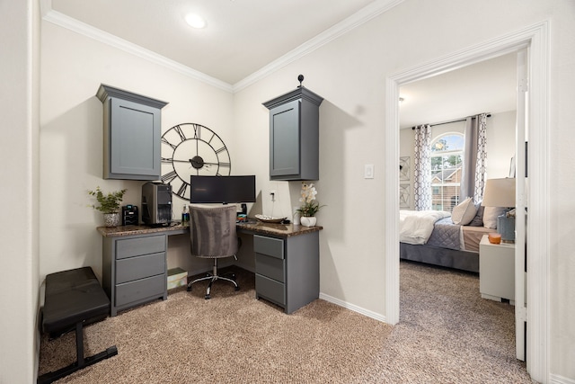 office area featuring light carpet, ornamental molding, and baseboards