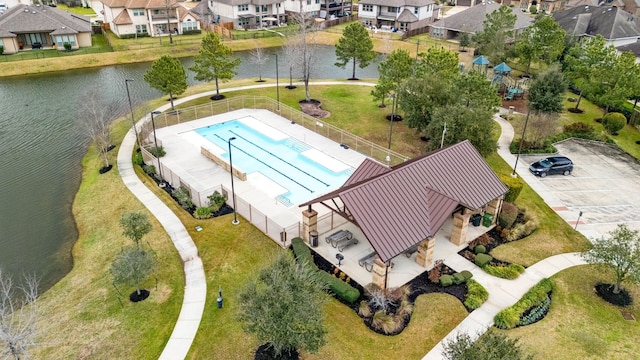 aerial view featuring a water view and a residential view