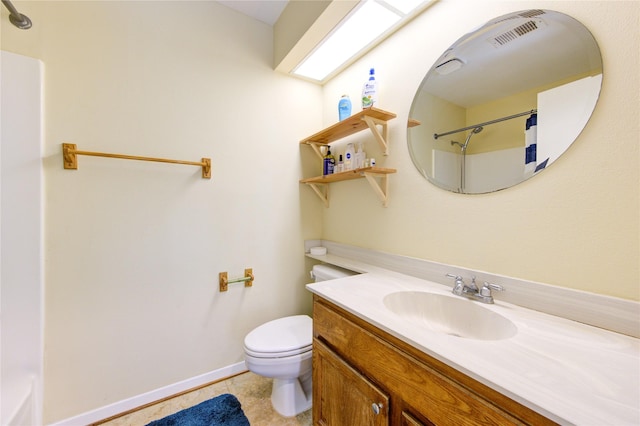 bathroom with baseboards, toilet, a shower with curtain, tile patterned flooring, and vanity