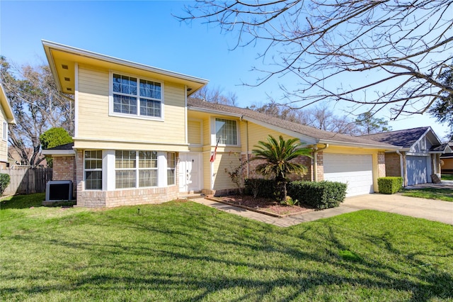 view of front of home with an attached garage, a front yard, concrete driveway, and brick siding