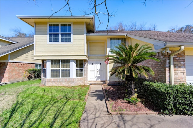 view of front of house with a front yard