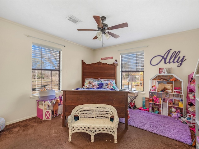 bedroom with baseboards, multiple windows, visible vents, and carpet flooring