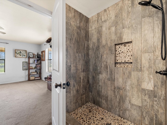 full bathroom featuring tiled shower