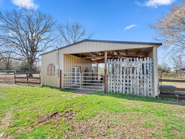 view of outbuilding with an outbuilding and an exterior structure