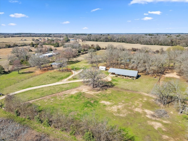 birds eye view of property with a rural view