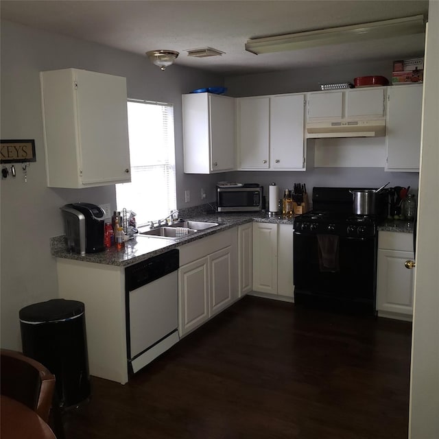 kitchen with white cabinets, dishwasher, black gas range oven, and a sink