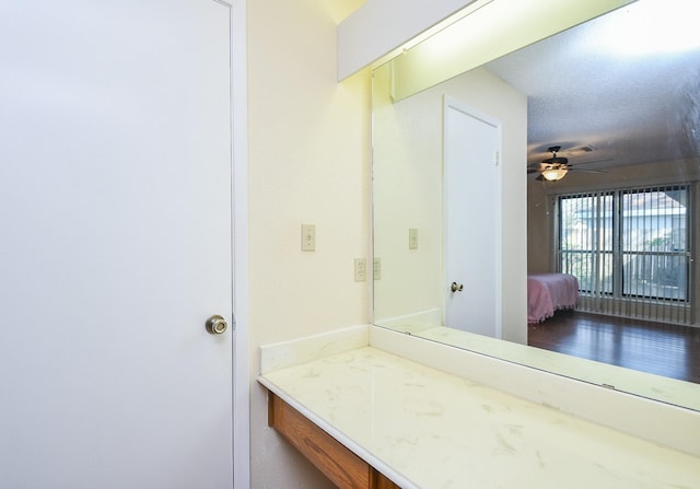 bathroom featuring ceiling fan