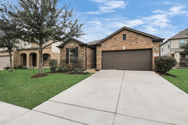 view of front of house featuring a garage, a front lawn, concrete driveway, and brick siding