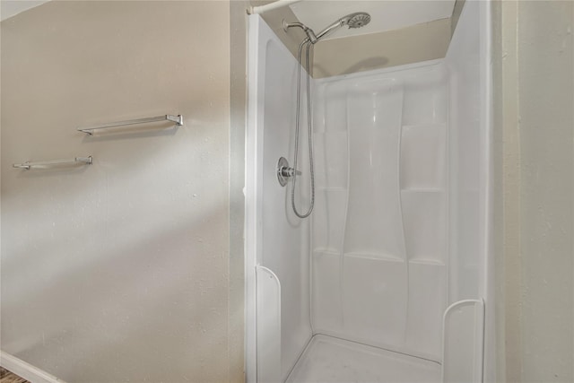 full bathroom with a stall shower