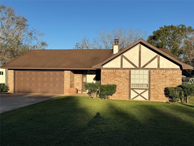 tudor-style house with a garage, driveway, brick siding, and a front lawn