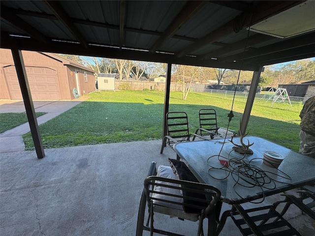 view of patio / terrace featuring a fenced backyard and an outdoor structure