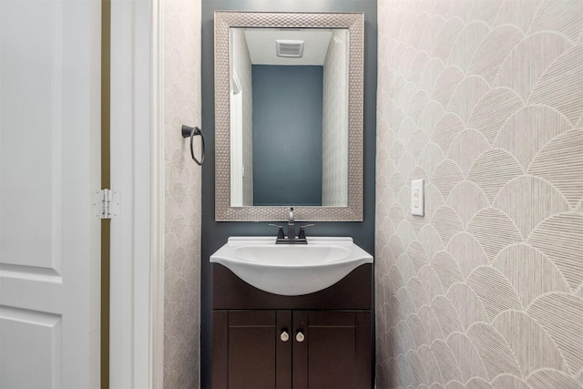 bathroom with visible vents and vanity