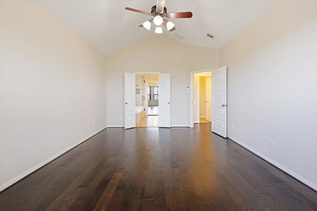 unfurnished bedroom featuring dark wood-style floors, baseboards, and visible vents