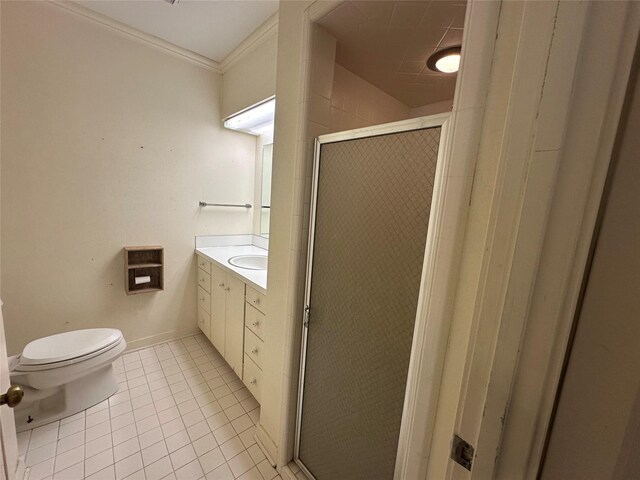 full bath featuring a shower stall, toilet, ornamental molding, tile patterned floors, and vanity