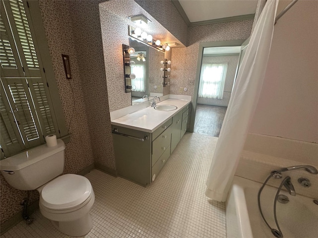 full bathroom featuring vanity, wallpapered walls, ornamental molding, toilet, and shower / tub combo with curtain