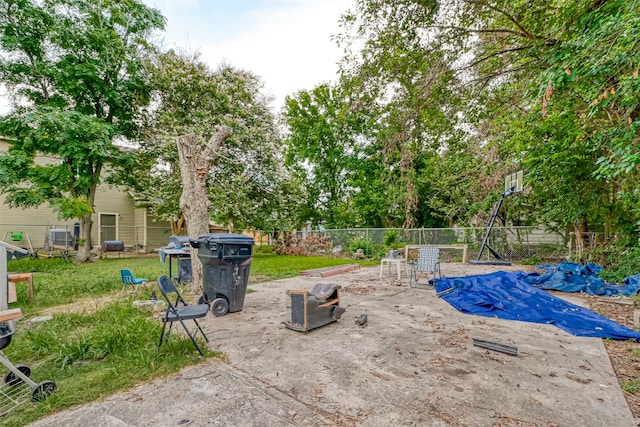 view of patio / terrace featuring fence