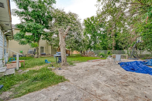 view of yard with a fenced backyard and a patio